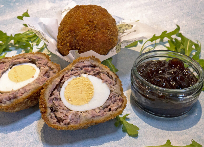 scotch eggs served with pickle